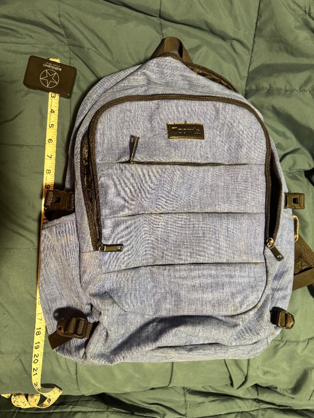 Tzowla backpack with headphone and charger ports